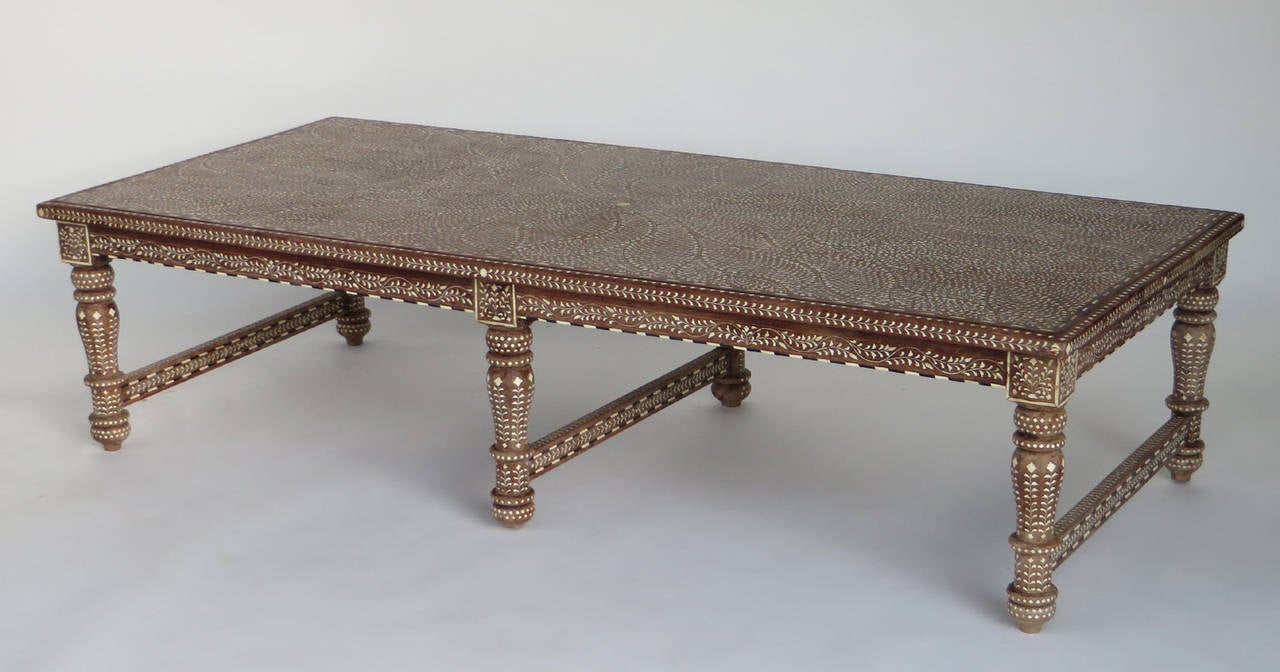 Teak and bone inlay coffee table from India.
