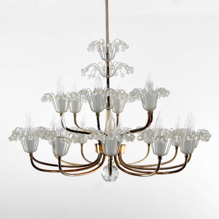 Eighteen light chandelier by Emil Stejnar.

Dimensions: 15" H, 26" D without drop, 34" H, with drop.


