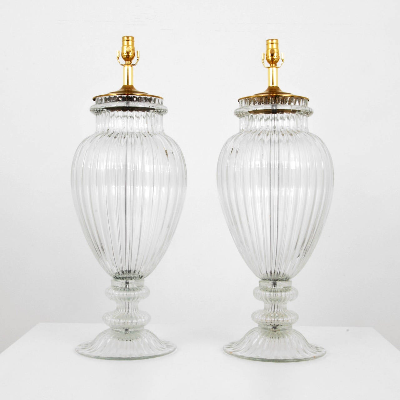 Pair of large ribbed blown glass lamps in the manner of Barovier & Toso, Murano, Italy.