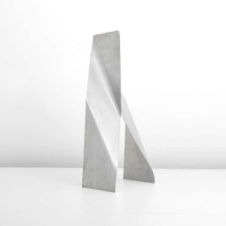 DESIGNER & MANUFACTURER: John Chase Lewis

MARKINGS: none

ORIGIN & MATERIALS: USA; aluminum

ADDITIONAL INFORMATION: Large John Chase Lewis Floor Sculpture by  (1909-2005). John Chase Lewis attended Depaun University in which he received an