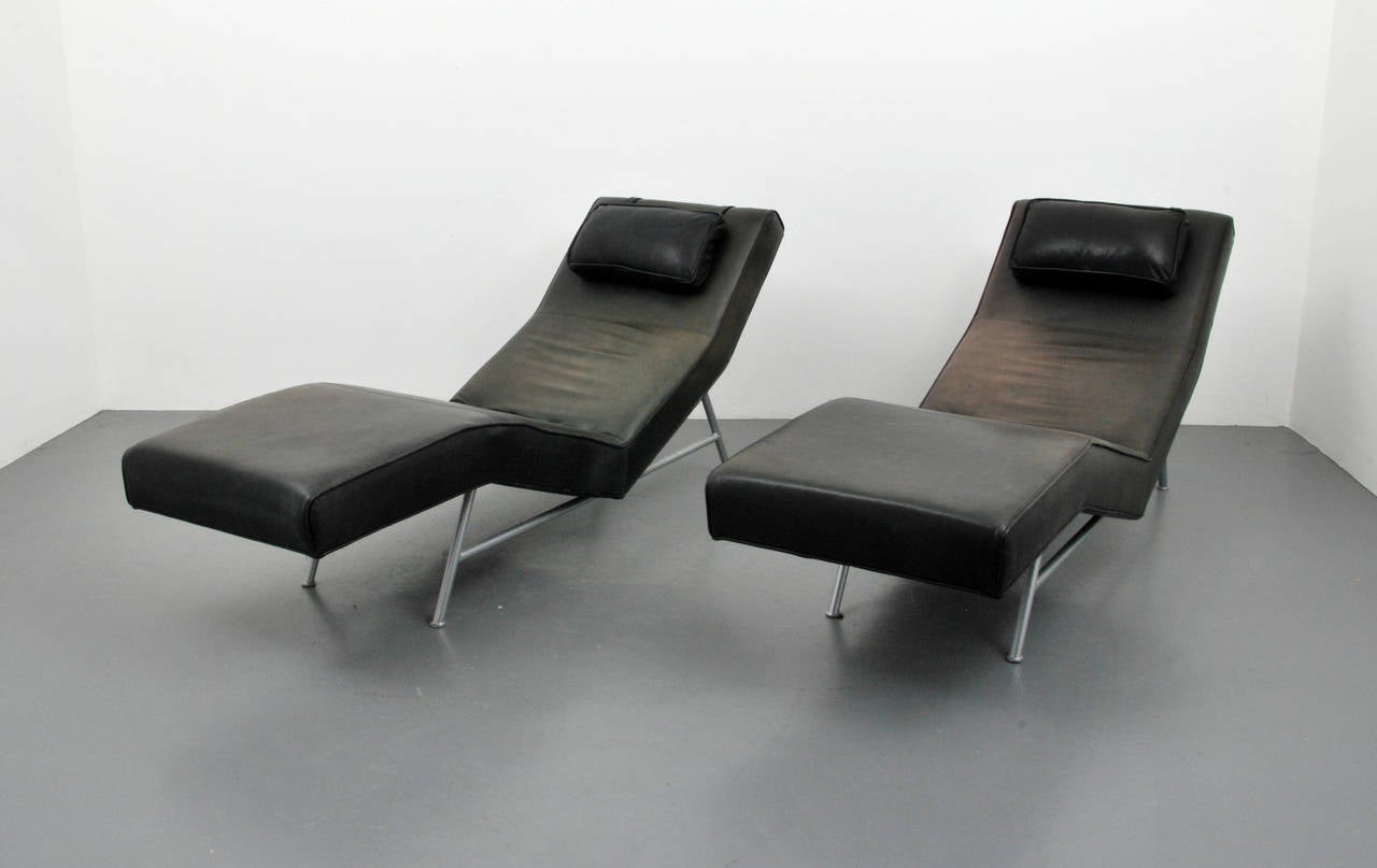 Chairs have fine leather seats and headrests and are designed by Milo Baughman for Thayer Coggin. The chairs are marked and are later reissues. Priced as a pair but available individually, please inquire.