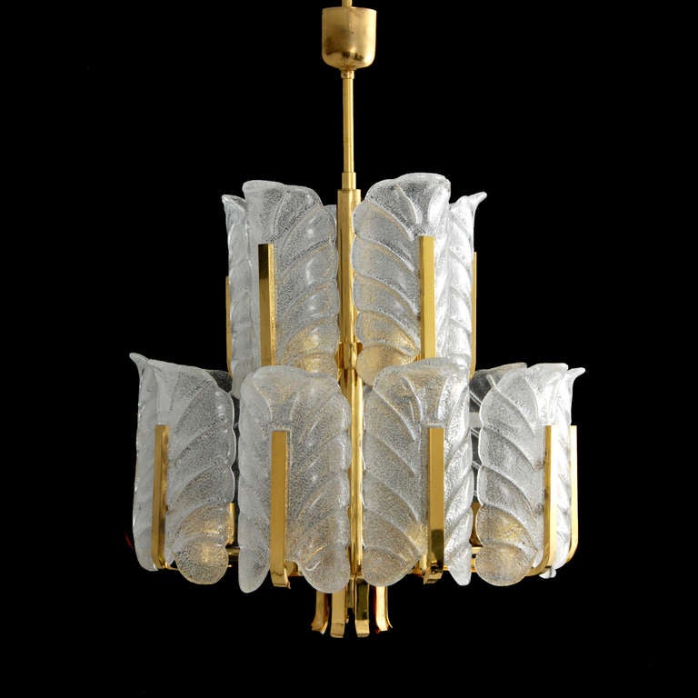 DESIGNER & MANUFACTURER: Carl Fagerlund; Orrefors

MARKINGS: none

COUNTRY OF ORIGIN & MATERIALS: Sweden; glass, metal

ADDITIONAL INFORMATION & CIRCA: Multi-tiered glass chandelier by Carl Fagerlund for Orrefors.

