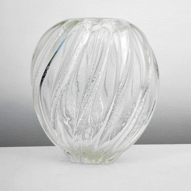 DESIGNER & MANUFACTURER:  Archimede Seguso 

MARKINGS: none

COUNTRY OF ORIGIN & MATERIALS: Murano, Italy; blown glass

ADDITIONAL INFORMATION: Fine and large blown glass vase with silver aventurine throughout by Archimede Seguso, Murano,