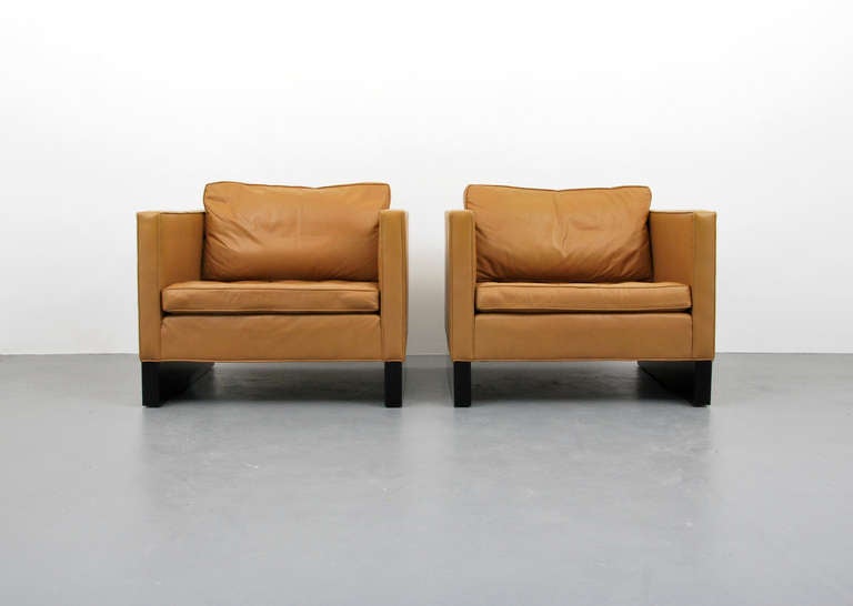 Designer and Manufacturer: Mies van der Rohe (1886-1969)

Markings: none

Country of Origin and Materials: USA; leather, wood

Additional Information: Pair of large and comfortable lounge chairs with buttoned and tufted seat cushions by Mies