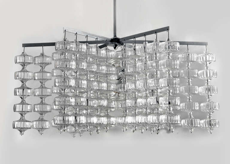 Rare chandelier designed by Aloys Gangkofner. Six matte steel arms with twenty-five glass drops hanging from each arm, for a total of one hundred and fifty individual pieces of handblown glass. Commissioned for the foyer of the Theater AM Park,