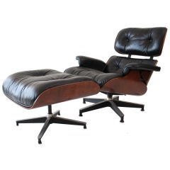 Rosewood & Leather Lounge Chair & Ottoman by Charles & Ray Eames