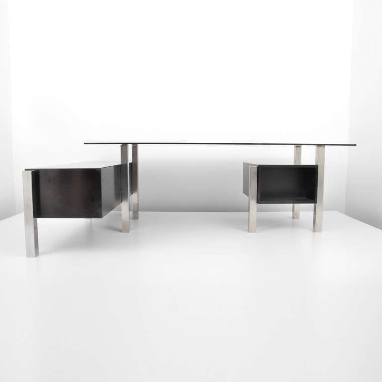 Italian desk with two detached cabinets, one with three drawers, the other with three drawers and sliding door by Forma Nova.

  
