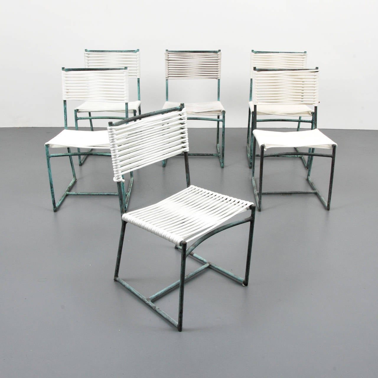 Set of six outdoor dining/side chairs by Walter Lamb for Brown Jordan.