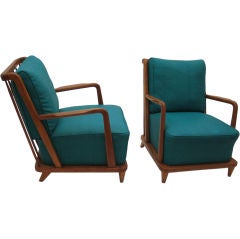A pair of French 1950s fruit wood armchairs