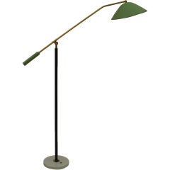 Italian floor standing light in brass with green domed shade