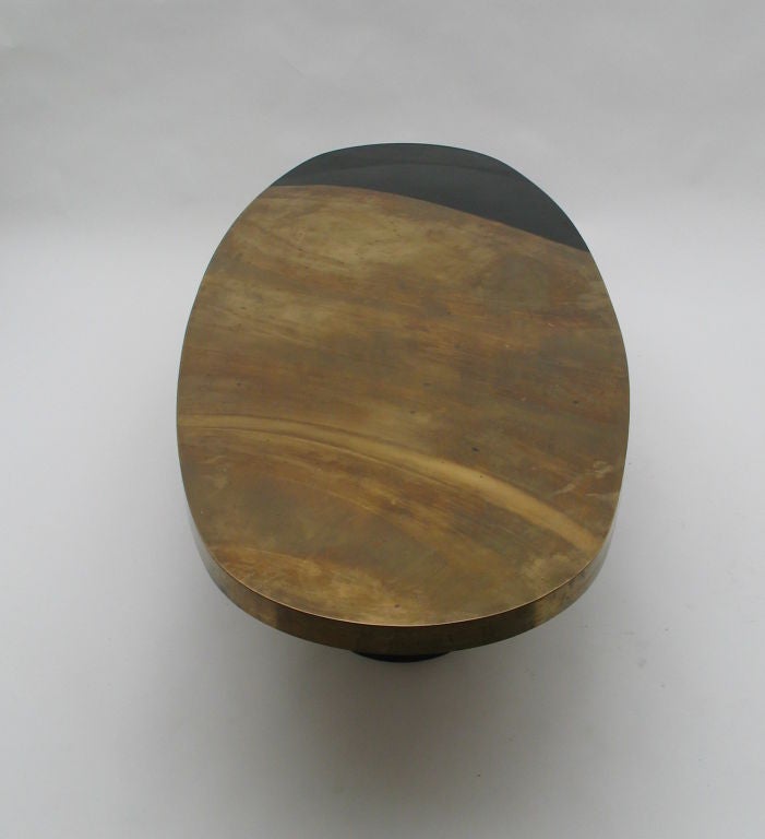 A 1970s French brass oval coffee table