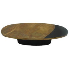 A 1970s French brass oval coffee table