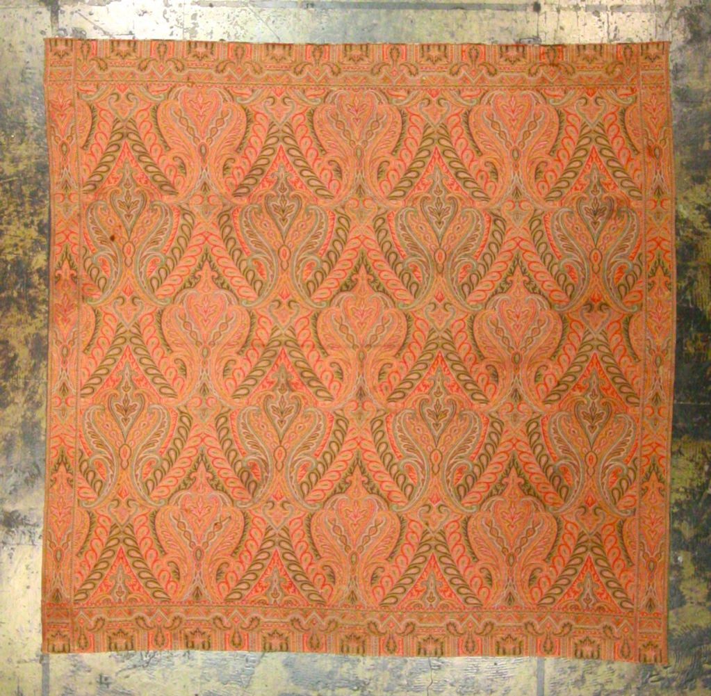 Rare, double-sided piece, this piece is 100% hand-loomed wool. Vivid reds, brown, terra cotta colors with hints of green.