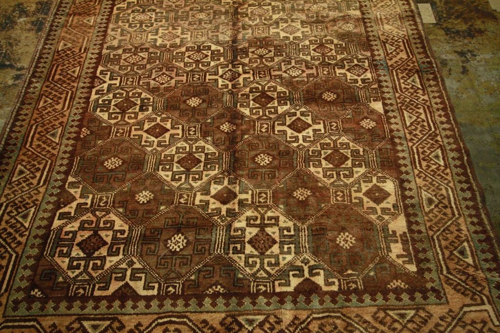Vintage Afghan Rug from circa the 1920's.  Hand made from 100% hand spun wool