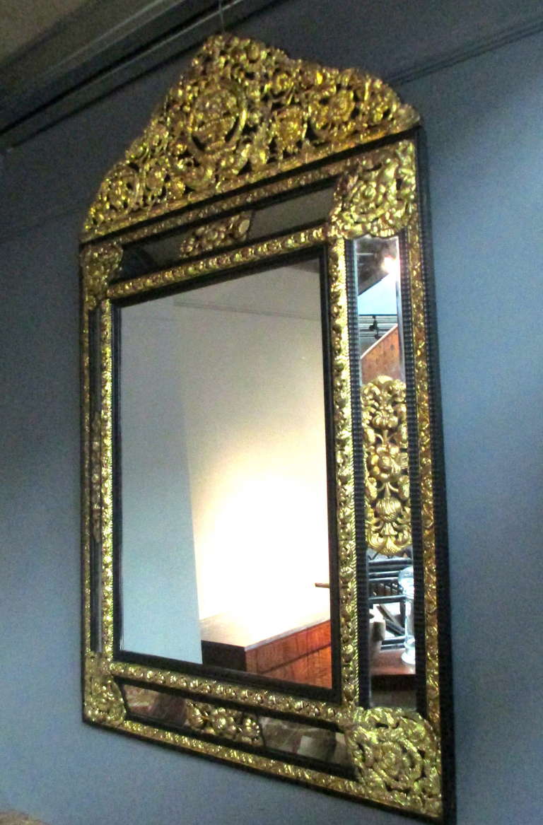 A Flemish Ebonised & Gilt Brass Mirror