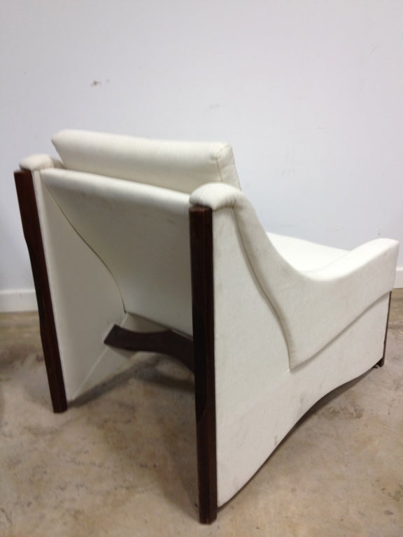 A Pair Of Designer Armchairs