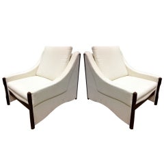 A Pair Of Designer Armchairs