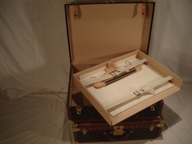 Mid-20th Century Pair Of Matching Louis Vuitton Siutcases
