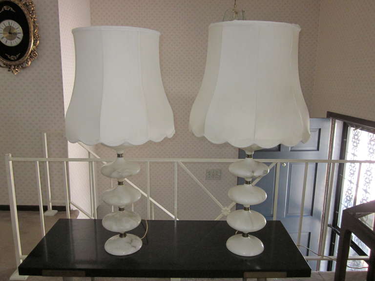 Great pair of mid-century alabaster lamps, with original shades.  With alabaster finials to match.
