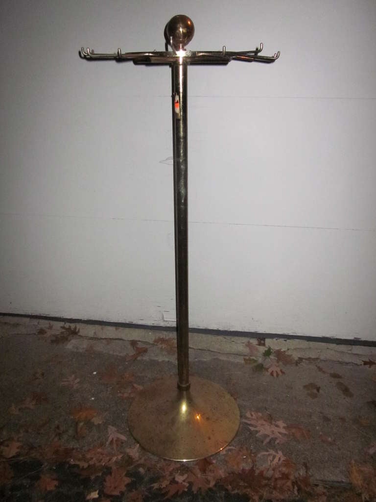 Vintage Ralph Lauren solid brass revolving tie and belt hanging rack.