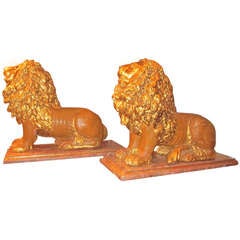 Pair of Carved and Painted Lions on Stands