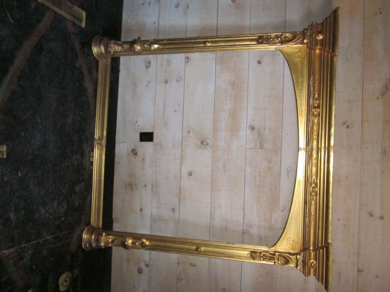 Carved and gilt wood Arts and Crafts mirror or picture frame.

Opening measurements: 50