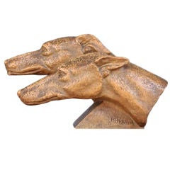 Two artdeco's greyhounds in terracotta