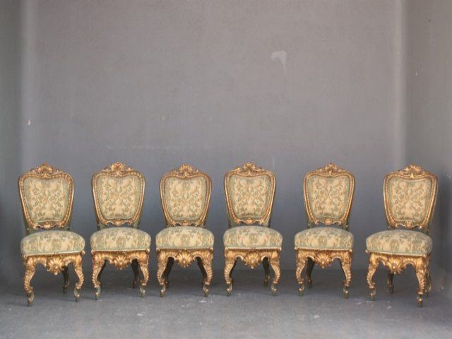 Rare set of six dining chairs in giltwood dating back to the middle of the XIX th century in the grotto's style the ulphoster was redone 2 years ago.