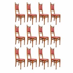 Set of 12 oak chairs by Eugenio Quarti