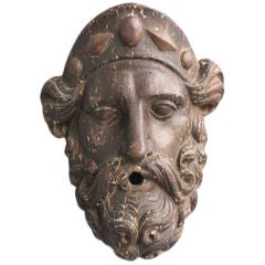 A decorative18th century italian wooden face