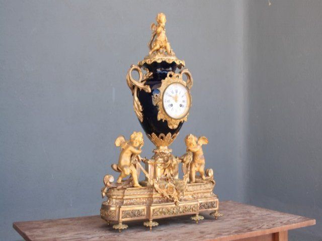 XIX th century bronze and Sevres porcelain clock set
