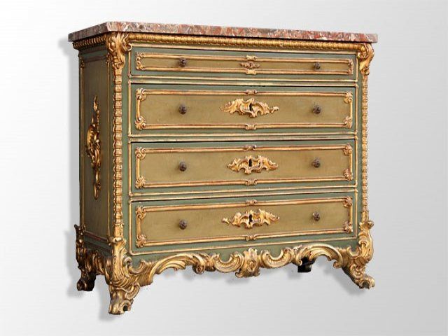 A rare painted and gilt venitian chest of drawers, coming directly from a palazzio in milano.