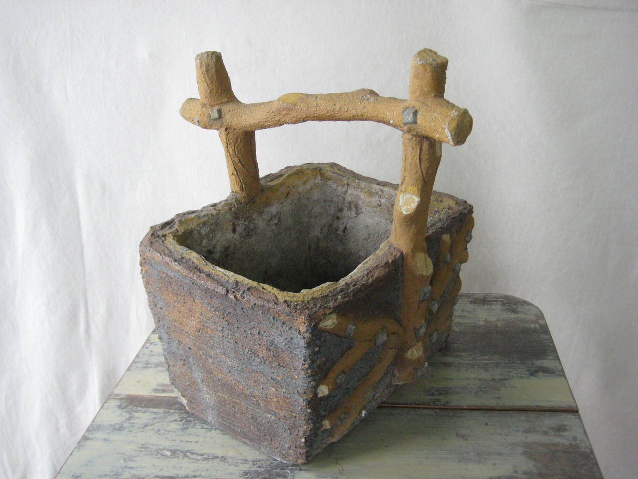 Faux de Bois Stone Basket with twig motif