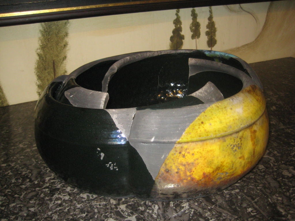Large Raku fired Pinwheel Bowl with vibrant colors of yellow, blues, greys and black. One of a kind ceramic.