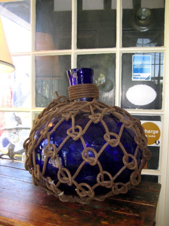 Cobalt blue glass float with netting