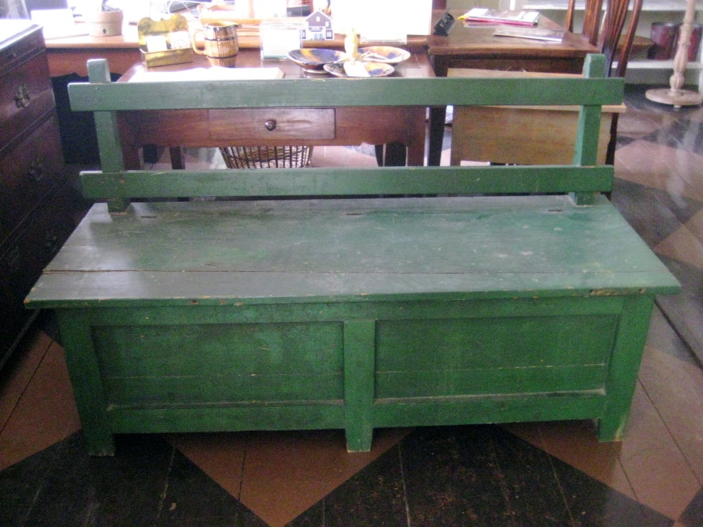 English green painted bench with rustic back and lift seat