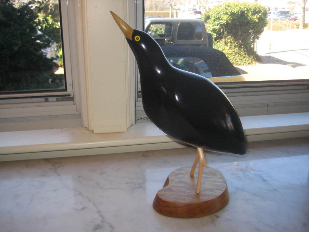 Large painted wooden bittern on a maple base.