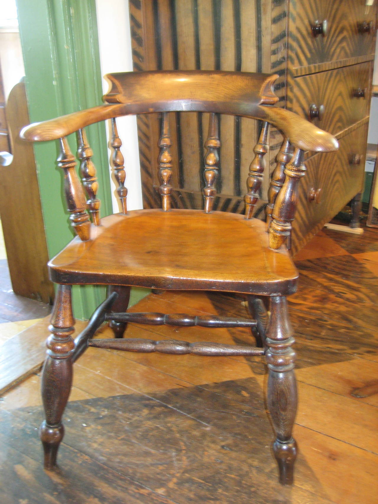 Antique Oak Captain's Chair with Custom seat cushion.