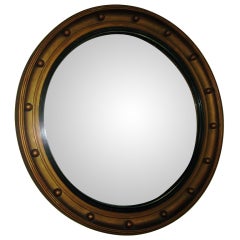 Antique Convex round mirror with gilded frame