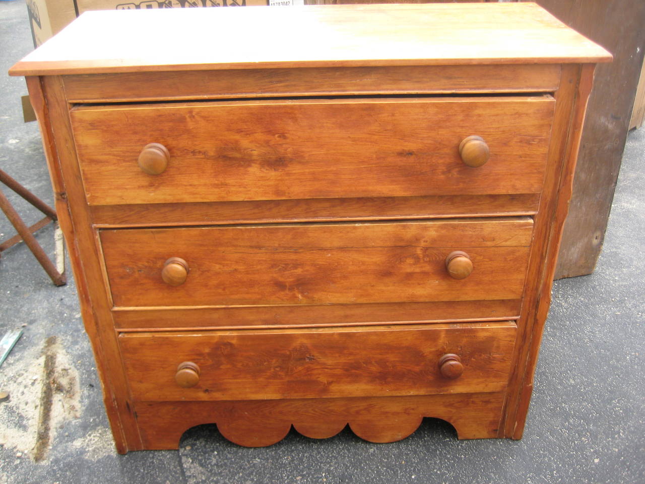 Pine Chest of Drawers with traces of original red paint and a nicely shaped skirt.
