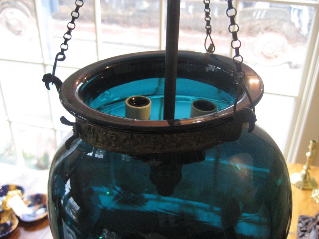 blue glass bell jar fixture with three candle light; needs to be rewired