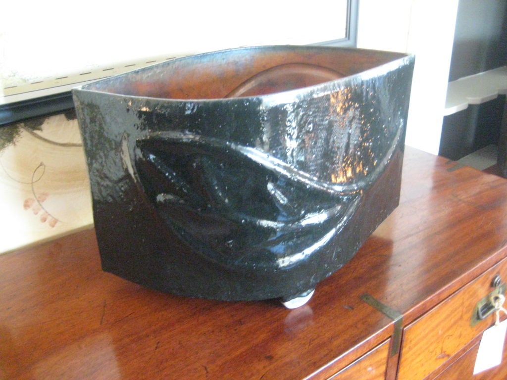 Deep greenish black glazed ceramic vessel.
One of a kind ceramic.