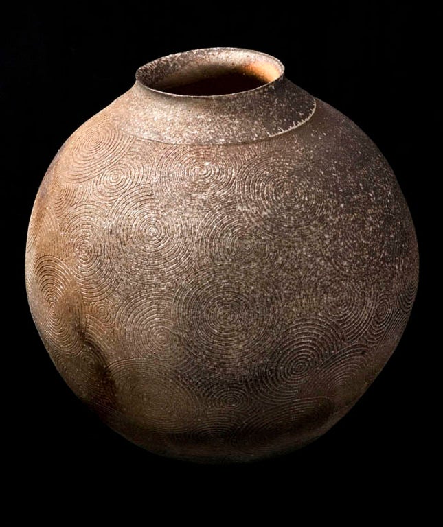 Kato Takahiko (B. 1952) was born in Shigaraki to a family with a tradition of Shigaraki pottery, and Seto. One hardly comes across a Kato in Shigaraki yet the name abounds in Seto and Mino.  Kato went to Shigaraki, and thus the family took root