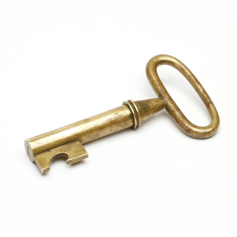 Designer Carl Aubock, circa 1950. Vintage skeleton key with hidden corkscrew. Teeth of key may be used as a bottle opener.