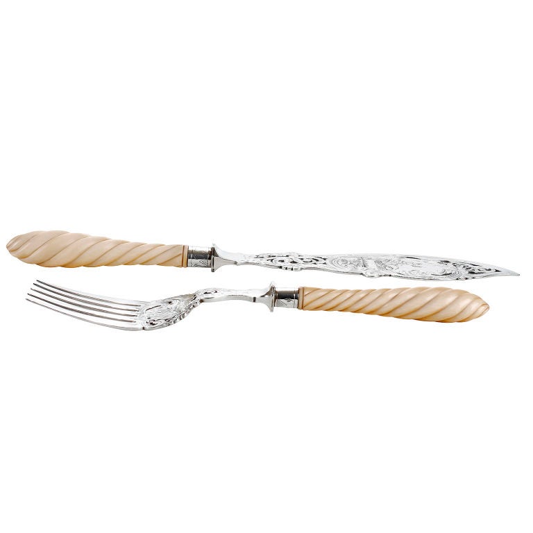 Antique Fish Servers, Silver Plated with Ivory Handle engraved with fly fisherman.