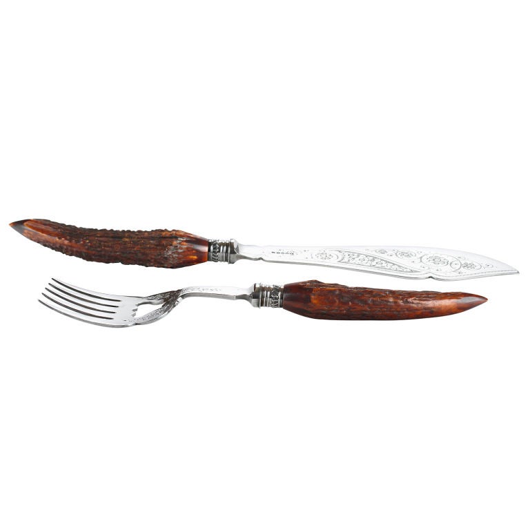 Engraved silver plate Fish serving set with antler handles. Designer is HB&H Sheffield of 19th century England.