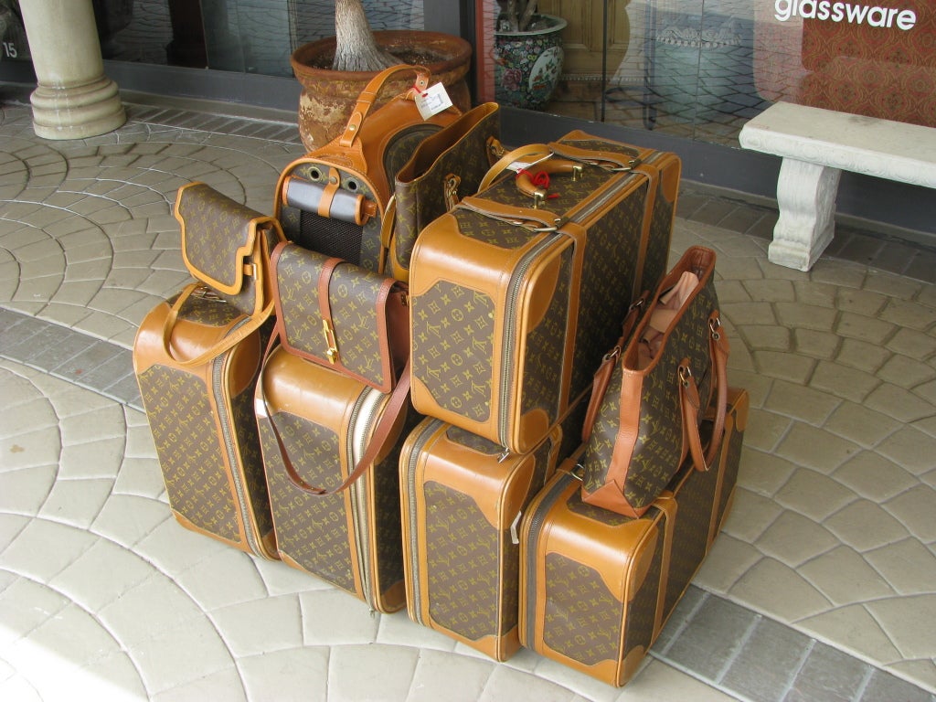 Very nice, Vintage Louis Vuitton Monogram 10 Piece set of assorted luggage.

Set Includes: 
2 Larger Suitcases: 28”W x 20”D x 9.5”H (One is personalized, N.E.S. and one is personalized, B.S.)
2 Smaller Suitcases: 22”W x 14”D x 8”H (One is