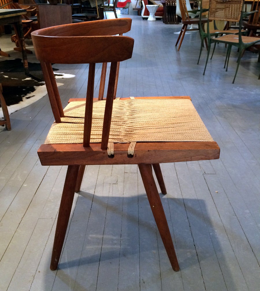 Set of Four Walnut and Woven Seat Chairs by George Nakashima 2