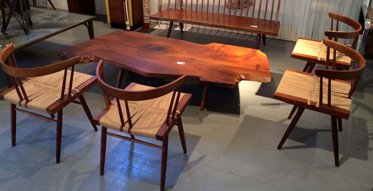 American Set of Four Walnut and Woven Seat Chairs by George Nakashima