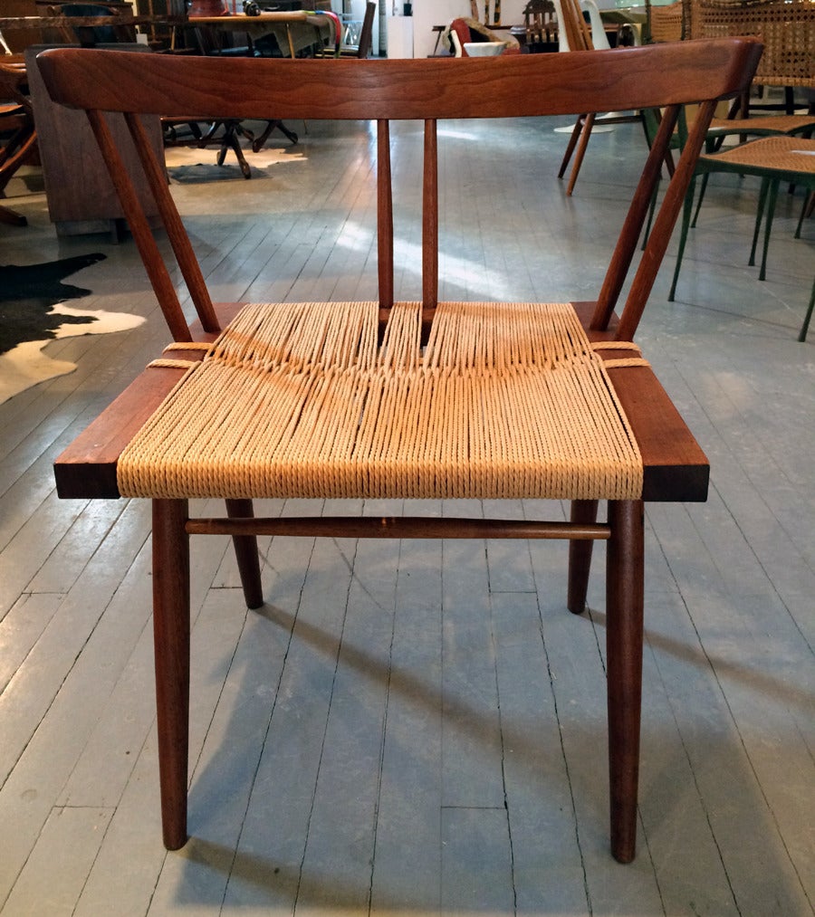 Mid-20th Century Set of Four Walnut and Woven Seat Chairs by George Nakashima